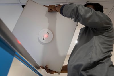 A sensor is installed. Antonie Robertson / The National