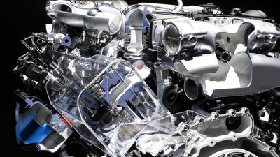 An engine from an Audi AG A8. The German firm has teamed up with France's Global Bioenergies to work on biofuel development. Pau Barrena/Bloomberg