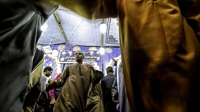 Muslims attend a ceremony to commemorate the final night of the "Mawlid" festival near Al Hussein mosque in Cairo. AFP