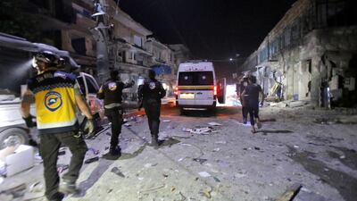 At least 12 people were killed and 18 others wounded in overnight strikes on the Idlib town of Maarat Al Numan, the Britain-based Syrian Observatory for Human Rights said. / AFP