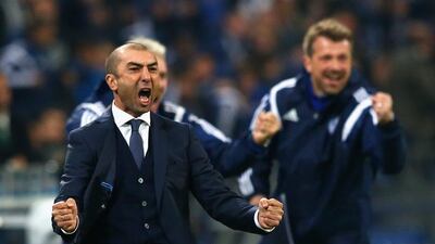 Schalke 04 manager Roberto di Matteo celebrates after his side's first goal in a 4-3 Champions League win against Sporting Lisbon on Tuesday night in Gelsenkirchen. Martin Rose / Bongarts / Getty Images