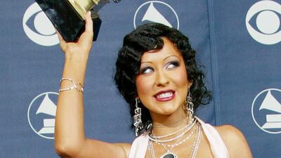 Singer Christina Aguilera wearing diamond drop earrings by Gilan from their Cintemani collection. Getty Images