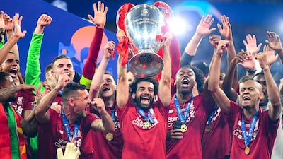 Salah lifts the Champions League trophy after Liverpool defeated Tottenham Hotspur in the 2019 final