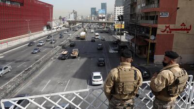 Lebanese army soldiers stand on a bridge in Jal El Dib, Lebanon. Reuters