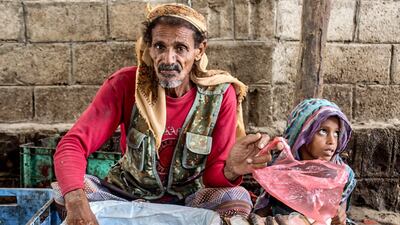 A Yemeni man picks and sells freshly-caught fish at a market in the Khokha district of the western province of Hodeidah, on January 21, 2019. AFP