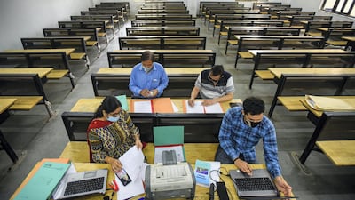 Faculty members answers students’ questions at Ramjas College in New Delhi. Getty
