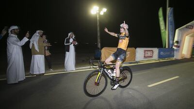 Rob Leemans celebrates after crossing the line in the penultimate leg of the Al Wathba Cycle Race Series. Mona Al Marzooqi / The National