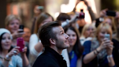 A clause in David Beckham's original MLS contract allowed for him to purchase a franchise at a discount rate, which he reportedly is now planning to do in Miami. Johannes Eisele / AFP