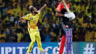 Chennai Super Kings' Imran Tahir, left, celebrates the dismissal of Royal Challengers Bangalore's Yuzvendra Chahal, right, during the VIVO IPL T20 cricket match between Chennai Super Kings and Royal Challengers Bangalore in Chennai, India. AP Photo