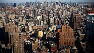 The view from the 63rd floor of One World Trade Center. The tower is 1,776 feet, but 1,368 without its spire making it shorter than the Willis Tower in Chicago. Andrew Burton / Getty Images / AFP