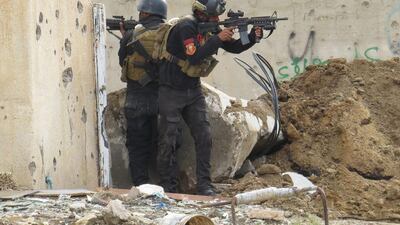 Iraqi forces secure an area near the Grand Mosque in central Ramadi, the capital of western Anbar province, on January 8, 2015, after retaking the city from ISIL. The fight against the extremist group in Iraq has focused on the north of the country after government forces pushed the militants out of Ramadi last month. AFP