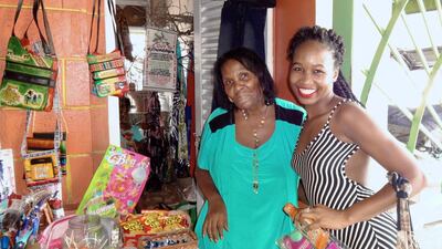 Christine Souffrant, right, with a street vendor in Antiqua. Courtesy Christine Souffrant