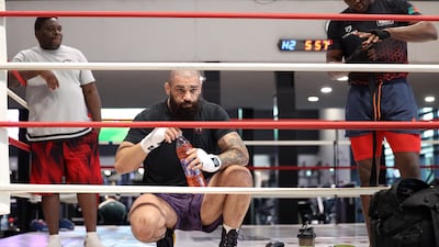 Pouya Rahmani takes a break during a training session.