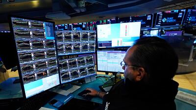 A trader on the floor of the New York Stock Exchange. Markets assumed the US Federal Reserve would not start to increase interest rates until 2024. AP Photo / Richard Drew