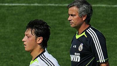 Jose Mourinho, the Real Madrid coach, watches over one of his recent recruits, Mesut Ozil, the German playmaker.