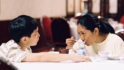 Angeli Bayani, as Teresa, and Koh Jia Ler, as young Jiale, in Ilo Ilo. Courtesy Fisheye Pictures