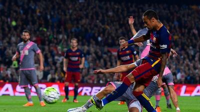Neymar of Barcelona scores his team’s third goal against Rayo Vallecano on Saturday night in a La Liga win at the Camp Nou. David Ramos / Getty Images
