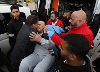 A Palestinian man is greeted by family and friends as he arrives in Ramallah after being released from an Israeli prison. EPA