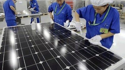The China Solar factory in Hangzhou. Dubai hopes to issue green sukuk to finance solar parks, biogas plants and energy efficiency devices for homes. Lang Lang / Reuters