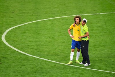 Thiago Silva of Brazil consoles David Luiz after Germany's 7-1 victory during the 2014 Fifa World Cup semi-final at Estadio Mineirao in Belo Horizonte on July 8, 2014. Getty