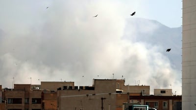 Smoke rises in central Tehran after an Israeli attack. EPA