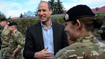 Britain's Prince William speaks with Polish and British soldiers in Rzeszow. EPA