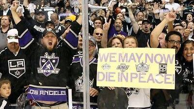 Los Angeles Kings fans celebrate after their team won Game Six of the 2012 Stanley Cup Finals to clinch the series against the New Jersey Devils.