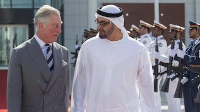 Sheikh Mohammed bin Zayed, Crown Prince of Abu Dhabi and Deputy Supreme Commander of the Armed Forces, walks with the Prince of Wales at the Presidential Airport yesterday. Ryan Carter / Crown Prince Court - Abu Dhabi