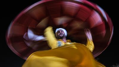 An Egyptian traditional dancer performs the Tanoura dance during a street performance in Sharm El Sheikh. EPA
