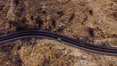 Electric vehicle drivers looking to embark on classic American holiday will need to plan ahead for long drives. Getty Images
