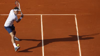 Federer's single-handed backhand - a rarity in men's tennis these days - came to good use yesterday during the Swiss player's domination over Somdev Devvarman. Thomas Coex / AFP