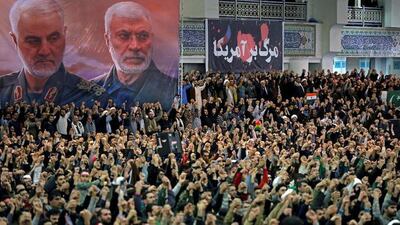 A poster shows late Iranian military commander Qassem Soleimani and late Iraqi militia commander Abu Mahdi al-Muhandis, as Iranian worshippers chant slogans during the Friday prayers sermon led by Iran's Supreme Leader Ayatollah Ali Khamenei, in Tehran, Iran January 17, 2020. Reuters