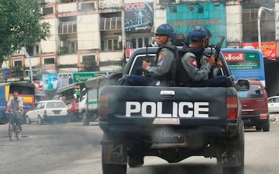 A police vehicle in Yangon in August 2009, where judgement on major opposition leader Aung San Suu Kyi was passed. Aung Hla Tun / Reuters