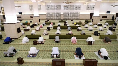 Saudis preform prayers at a mosque in Jeddah. Saudi Arabia has allowed the reopening of mosques to prayer while observing social distance on May 31. EPA