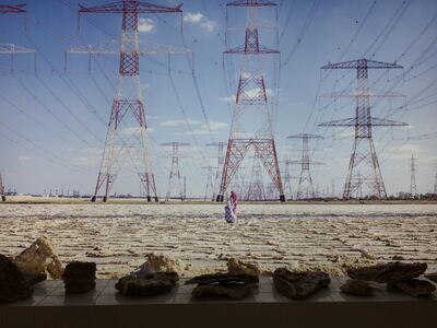 Installation of view of UAE National Pavilion at the Venice Biennale of Architecture 2021 with an image by Farah Al Qasimi in the background. John Brunton