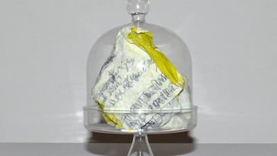 This is the potentially important napkin. "Two yeas ago, the Pan-Arabia Enquirer broke the story of a Dubai resident who had drawn up a solution to the Israel/Palestine problem only to leave it in a bar one night. This is thought to be the solution, later found in an ashtray. Unfortunately, scientists from the UN have been unable to decipher what it says.