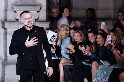 Lebanese fashion designer Georges Hobeika acknowledges the audience at the 2018 spring/summer Haute Couture collection fashion in Paris. AFP