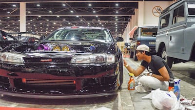 A 1998 Nissan Silvia being worked on at the show. Khushnum Bhandari for The National