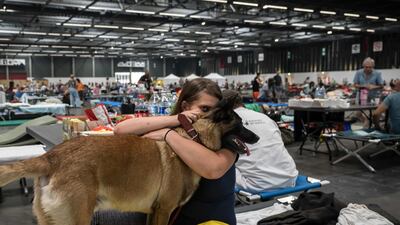 People displaced by the wildfires are being housed at an exhibition centre in Bordeaux. AFP