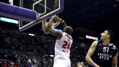 Samardo Samuels of Emporio Armani Milano dunks during their Euroleague win over Anadolu Efes Istanbul. Stefano Porta / EPA