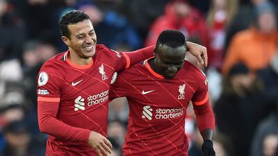 Thiago Alcantara, left, celebrates with teammate Sadio Mane after scoring Liverpool's third goal in their 4-0 win against Southampton at Anfield on Saturday, November 27. EPA