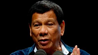 Philippine President Rodrigo Duterte addresses the Filipino community in Singapore. Welcomed an olive branch from Kuwait over their migrant labour row, days after President Rodrigo Duterte announced a permanent ban on Filipino workers going to the Gulf state. Yong Teck Lim / AP