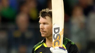 Australia's David Warner celebrates his half century. AFP