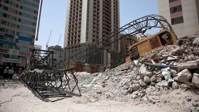 Inspector claims lapses in site procedures caused crane to collapse across Hamdan Street.