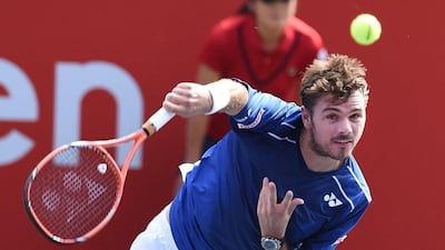 Stan Wawrinka serves during his first round win over Radek Stepanek on Tuesday at the Japan Open in Tokyo. Toru Yamanaka / AFP / October 6, 2015