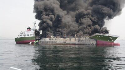 Black smoke rising from a 998-tonne oil tanker off the coast of Hyogo prefecture, around 450 kilometres (280 miles) west of Tokyo. Japan’s coastguard rushed to deal with an explosion and subsequent fire aboard a tanker off the country’s coast, officials and the prime minister said. AFP