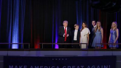 Republican US president-elect Donald Trump is accompanied by members of his family as he arrives to address supporters at his election night rally in Manhattan, New York. Brendan McDermid / Reuters
