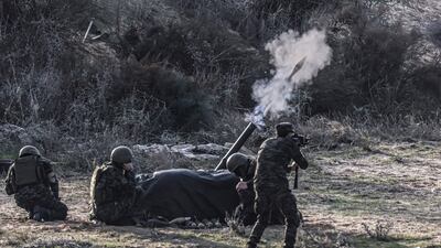 Palestinian militants train by shooting a rocket towards the sea from a site in Rafah, in the southern Gaza Strip, in December 2021. AFP