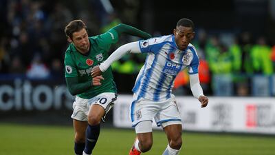 Right midfield: Rajiv van la Parra (Huddersfield) – Opened his Premier League account in spectacular style with a long-range goal to defeat West Bromwich Albion. Andrew Yates / Reuters