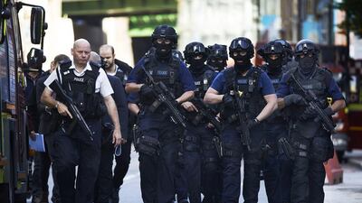Armed police arrive at The Shard in Britain’s capital following a terror attack on London Bridge. Niklas Halle’n / AFP Photo